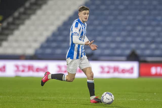 IN THE COLD: Midfielder Scott High has stopped training with Rotherham United but Huddersfield Town have not yet recalled him from his loan