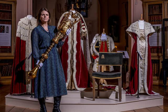 Curator Eleanor Brooke-Peat, with beautiful artefacts from Castle Howard's collection. Ceremonial robes and a full set of replica Crown Jewels are on display in the 300-year-old stately home's impressive Long Gallery to mark King Charles III's Coronation. The exhibition runs until 23rd July.

Picture Charlotte Graham