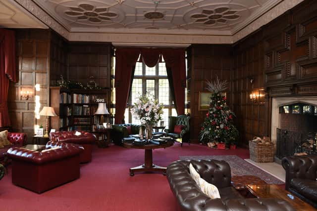 The library where guests can enjoy a cosy real fire and a host of historic features