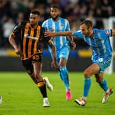Hull City's Cyrus Christie is chased down by Liam Kelly of Coventry City. (Picture: Bruce Rollinson)