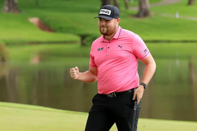 Dan Bradbury of England celebrates on the 18th hole after winning the Joburg Open at Houghton GC on November 27, 2022 (Picture: Luke Walker/Getty Images)