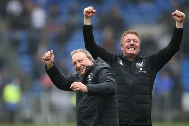 Huddersfield Town boss Neil Warnock and assistant Ronnie Jepson celebrate the Terriers key' late-season win at Cardiff City at the end of 2022-23. Picture: Press Association.