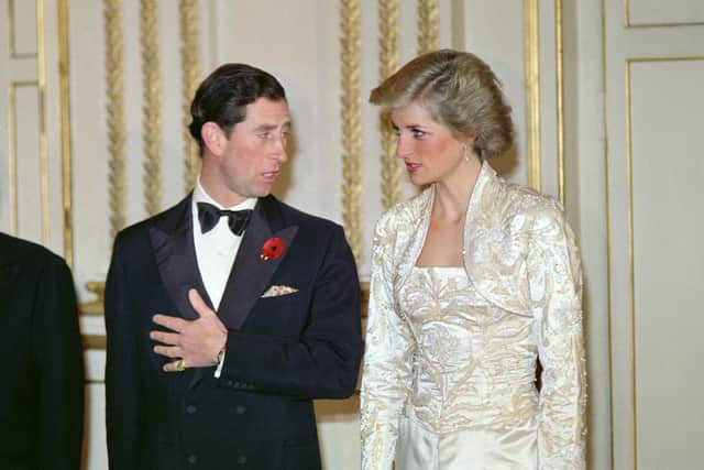 Prince Charles and Princess Diana attend a state dinner at the Elysee Palace in Paris on November 7, 1988 during a state visit in France. (Photo by Derrick CEYRAC / AFP) (Photo by DERRICK CEYRAC/AFP via Getty Images)