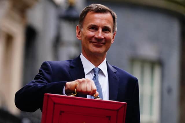 Chancellor of the Exchequer Jeremy Hunt leaves 11 Downing Street, London, with his ministerial box before delivering his Budget at the Houses of Parliament. PIC: Victoria Jones/PA Wire