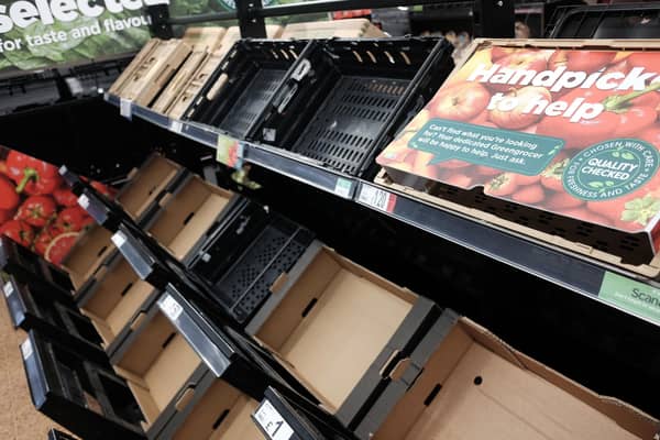 Empty fruit and vegetable shelves at an Asda. PIC: Yui Mok/PA Wire