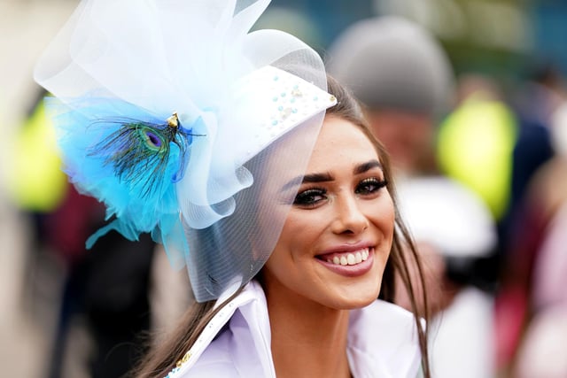 A racegoer during day two of the Randox Grand National Festival at Aintree Racecourse, Liverpool. (Photo credit should read: Mike Egerton/PA Wire)