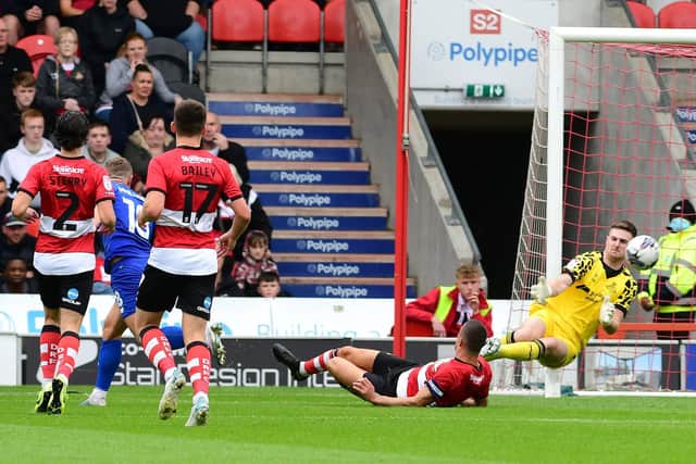 Picture: Andrew Roe/AHPIX LTD, Football, Sky Bet League Two, Doncaster Rovers v Harrogate Town, Eco-Power Stadium, Doncaster, UK, 05/08/23, K.O 3pm
Howard Roe>>>>>>07973739229

Doncaster Rovers' Ian Lawlor saves the shot from Harrogate Town's Matty Daly