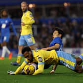 Mallik Wilks of Sheffield Wednesday battles for the ball with Koji Miyoshi of Birmingham City (Picture: Morgan Harlow/Getty Images)