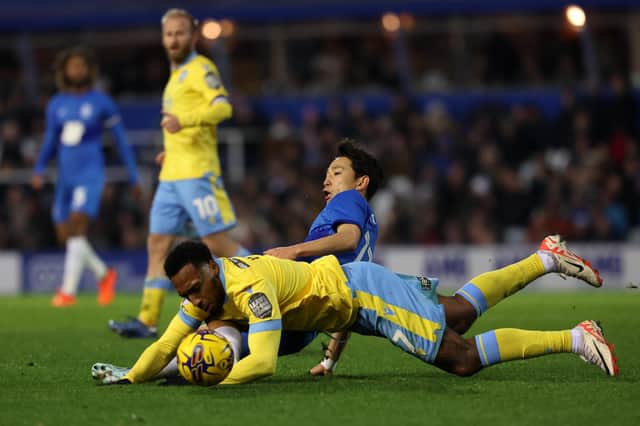 Mallik Wilks of Sheffield Wednesday battles for the ball with Koji Miyoshi of Birmingham City (Picture: Morgan Harlow/Getty Images)