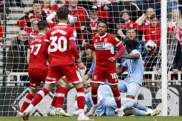 Middlesbrough's Cameron Archer (centre) celebrates scoring their side's first goal of the game during the Sky Bet Championship match at the Riverside Stadium, Middlesbrough. Picture date: Monday May 8, 2023. PA Photo. See PA story SOCCER Middlesbrough. Photo credit should read: Richard Sellers/PA Wire.

RESTRICTIONS: EDITORIAL USE ONLY No use with unauthorised audio, video, data, fixture lists, club/league logos or "live" services. Online in-match use limited to 120 images, no video emulation. No use in betting, games or single club/league/player publications.