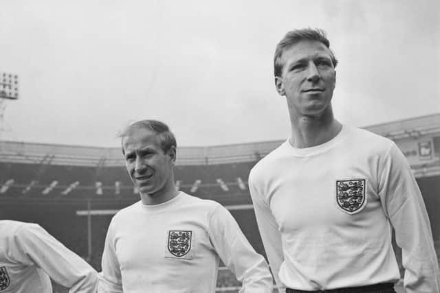 Bobby Charlton (left) of Manchester United and his brother Jackie Charlton (1935 - 2020) of Leeds United pose with the rest of the England team ahead of a British Home Championship match against Scotland at Wembley Stadium, UK, 10th April 1965. The score was 2-2.  (Photo by Evening Standard/Hulton Archive/Getty Images)