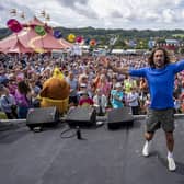People work out during a fitness exercise session with Joe Wicks at Glastonbury Festival. Photo: Ben Birchall/PA Wire
