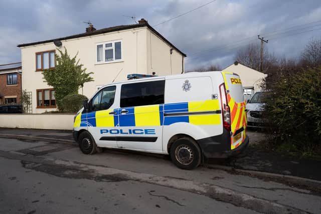 Police and forensic officers at at house in the sleepy village of in West Cowick, East Yorks