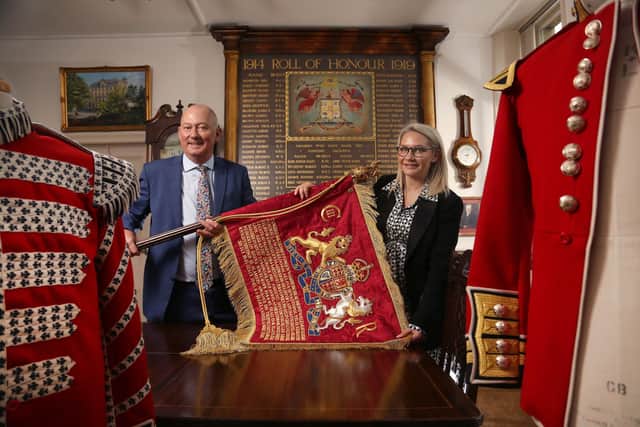 The new hand crafted Blues and Royals sovereign standard bearing the insignia of King Charles III is displayed by Robin and Rosie Wright, the father and daughter team who head military accoutrement manufacturer Wyedean, before it leaves the firm’s factory in Haworth, West Yorkshire for Saturday’s Trooping of the Colour in London. The fourth-generation family firm has been awarded a seven-year, £5 million contract to manufacture all the British Armed Forces’ regimental flags following King Charles’s coronation. Regimental standards and colours are usually renewed every 10-12 years, but all military regalia has required updating with the King’s insignia following the passing of the Queen.  Twenty Wyedean staff have been given tickets to see the standard on show for the first time at the King’s Birthday Parade at the Trooping The Colour this Saturday, 17 June.
