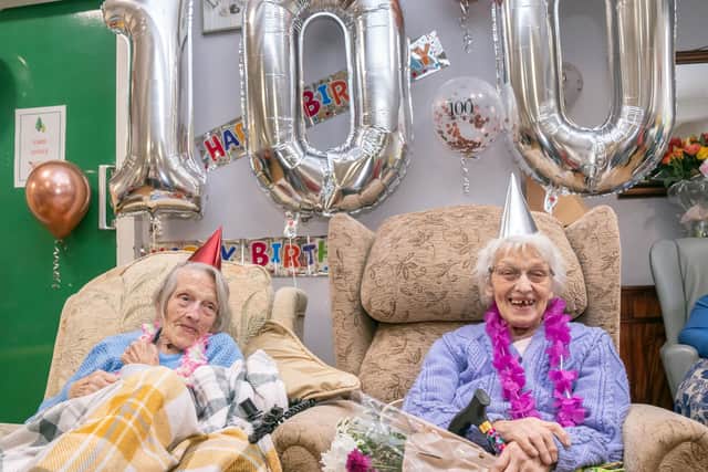 100-year-old twins Florence Boycott and Anne Brown, celebrate their birthday at The Firs residential care home in Barnsley. Photo credit: Danny Lawson/PA Wire