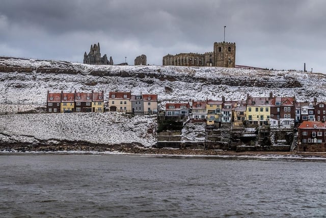 Whitby Abbey dominates the landscape of this small fishing community on the East Coast of Yorkshire as the remains of the snow.