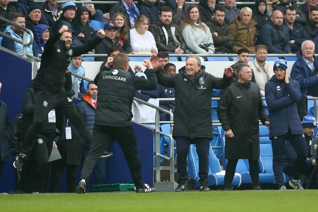 Huddersfield Town Manager, Neil Warnock, and his coaching staff celebrate after the full time whistle in the Sky Bet Championship match at the Cardiff City Stadium, Wales. Picture date: Sunday April 30, 2023. PA Photo. See PA Story SOCCER Cardiff. Photo credit should read: Nigel French/PA Wire.

RESTRICTIONS: EDITORIAL USE ONLY No use with unauthorised audio, video, data, fixture lists, club/league logos or "live" services. Online in-match use limited to 120 images, no video emulation. No use in betting, games or single club/league/player publications.