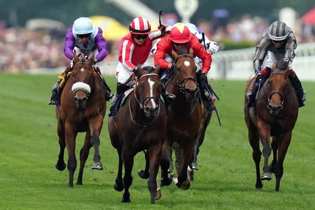 NOT THIS TIME: Bradsell ridden by jockey Hollie Doyle (second left) edges out Highfield Princess and Jason Hart in the King's Stand Stakes on day one of Royal Ascot in June Picture: John Walton/PA