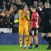 BIG DECISION: Referee Robert Jones awards Sheffield United a stoppage-time penalty signed off by VAR Chris Kavanagh