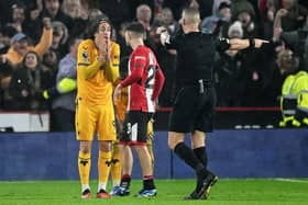 BIG DECISION: Referee Robert Jones awards Sheffield United a stoppage-time penalty signed off by VAR Chris Kavanagh