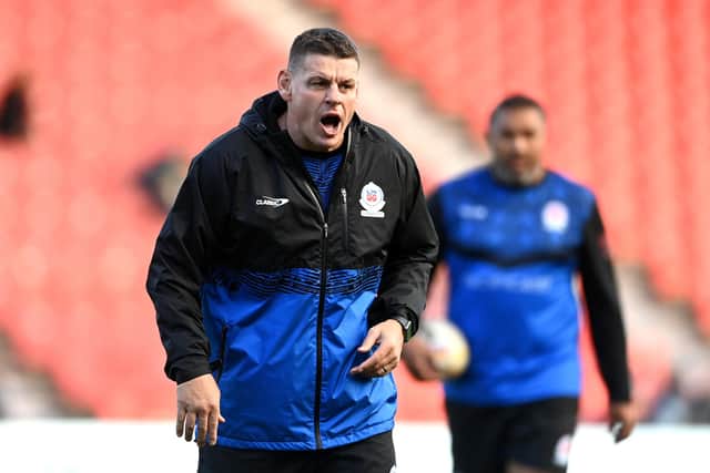 LISTEN UP: Assistant coach Lee Radford barks out instructions to the Samoa squad during practice. Picture: Gareth Copley/Getty Images