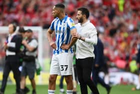 FRUSTRATION: Huddersfield Town manager Carlos Corberan consoles Jon Russell following the Terriers' Sky Bet Championship Play-Off Final defeat at Wembley against Nottingham Forest last year. Picture: Mike Hewitt/Getty Images