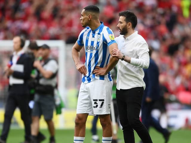 FRUSTRATION: Huddersfield Town manager Carlos Corberan consoles Jon Russell following the Terriers' Sky Bet Championship Play-Off Final defeat at Wembley against Nottingham Forest last year. Picture: Mike Hewitt/Getty Images