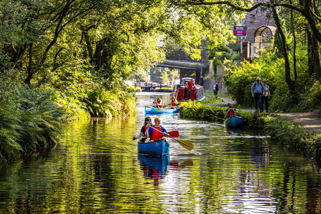 Staff and volunteers at the Canal & River Trust take the opportunity for taster canoe trips on the Huddersfield Narrow Canal at Standedge Tunnel and Visitor Centre at Marsden near Huddersfield.
 Picture Tony Johnson