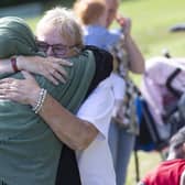 A hug is shared at a Great Get Together event. Photo: Jo Cox Foundation