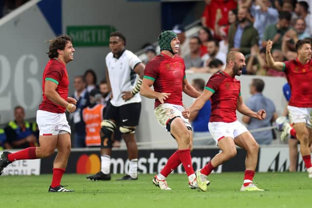 GROW THE GAME: Portugal's players celebrate after victory over Fiji at the Stade de Toulouse last Sunday. Picture: CHARLY TRIBALLEAU/AFP/Getty Images