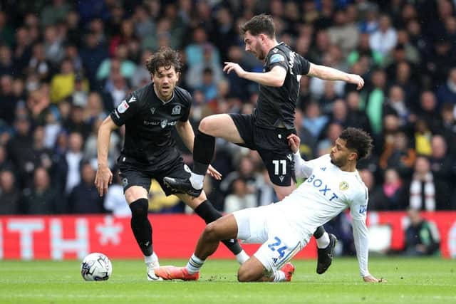 IN THE THICK OF IT: Georginio Rutter tackles Blackburn Rovers' Joseph Rankin-Costello