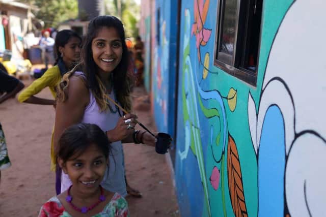 Saroj works with poor villages in India teaching them to paint murals Project Paintbrush_India_Goa_Photographer Rob Lyon