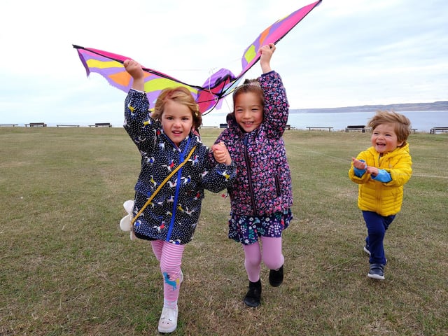 Annie, Emi and Eddie having kite funr