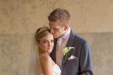 Chelsie and Glyn Whibley on their wedding day. (Chelsie Whibley / SWNS)