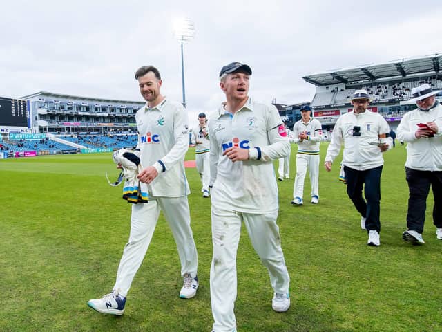 Spin twins Dan Moriarty, left, and Dom Bess leave the field after taking four wickets each in the Glamorgan first innings at Headingley. Picture by Allan McKenzie/SWpix.com