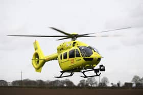 A Yorkshire Air Ambulance helicopter in flight.
