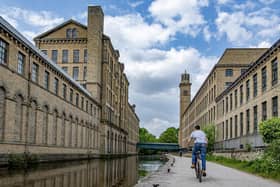 Salts Mill and New Mill by the Leeds Liverpool Canal. (Pic credit: Tony Johnson)
