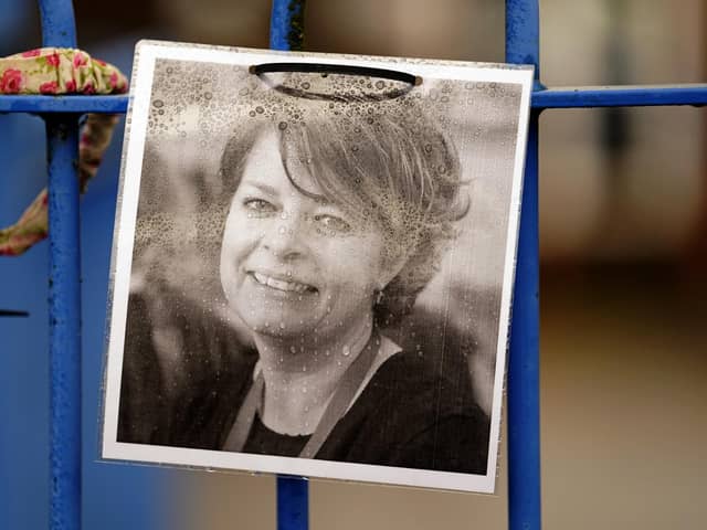 A photograph of Ruth Perry attached to the fence outside John Rankin Schools in Newbury, Berkshire. PIC: Andrew Matthews/PA Wire