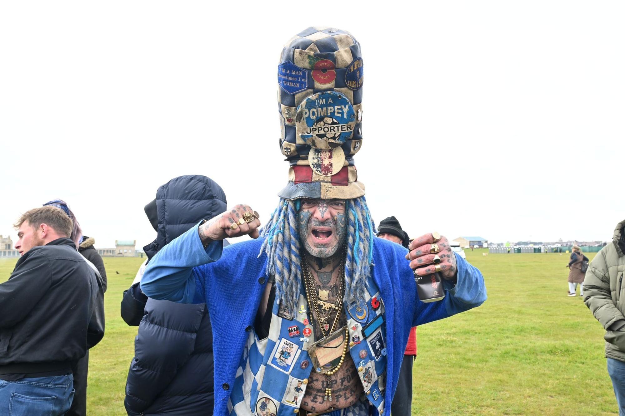 Man dubbed Britain's biggest football fanatic holds poetry nights in his antiquarian bookstore