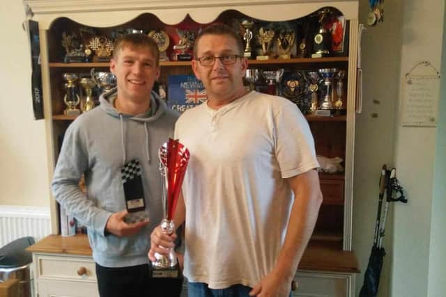 Barry with his son Robert, who has won many karting trophies.