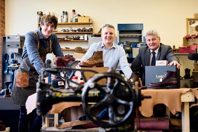 Dean Westmoreland (left), owner of Yorkshire Sole Shoemakers and Restorers pictured with Anthony Cope (centre), investment manager, Finance Yorkshire and Alex McWhirter (right), chief executive of Finance Yorkshire. Picture by Shaun Flannery.