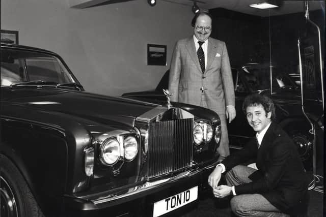 Tony Christie, right,  taking delivery of his new Rolls Royce Silver Shadow on June 16,  1980.