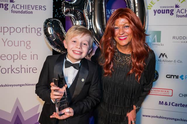 Rocco receiving his award from a previous winner, Liz Green, on behalf of the sponsors, M & J Carter.