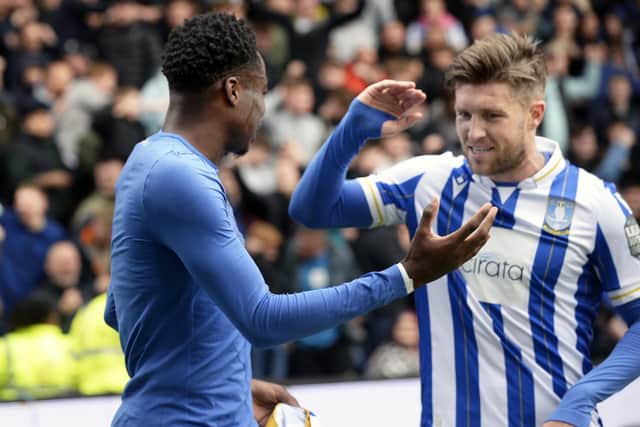 Anthony Musaba is congratulated by Josh Windass, who would later score the third goal, for scoring the first (Picture: Steve Ellis)