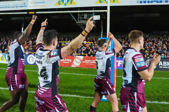 The Tigers celebrate their first Super League win of the season. (Photo: Olly Hassell/SWpix.com)