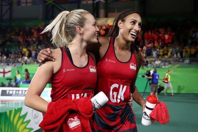 Chelsea Pitman (L) and Geva Mentor of England celebrate victory in the Netball Gold Medal Match on day 11 of the Gold Coast 2018 Commonwealth Games at Coomera Indoor Sports Centre (Picture: Hannah Peters/Getty Images)