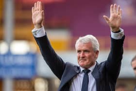 PRIDE: Mark Hughes salutes the Bradford City fans before the game