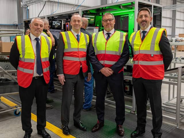 Pictured at the new Ideal Heating heat pump production line are, from left, Jason Speedy, chief operations officer; Lord Callanan; Shaun Edwards, CEO, Groupe Atlantic UK, Republic of Ireland and North America; and Mark Derbyshire, managing director (domestic products).