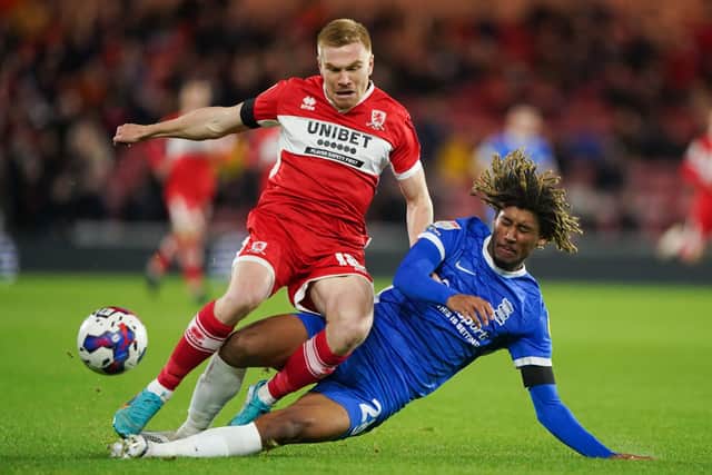 Middlesbrough's Duncan Watmore (left) and Birmingham City's Dion Sanderson battle for the ball (Picture: PA)