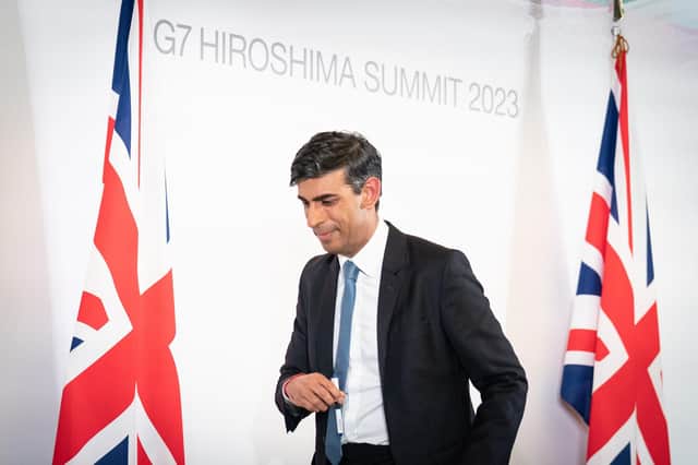 Prime Minister Rishi Sunak turns his back for five minutes at the G7 summit in Hiroshima, Japan, and yet another crisis erupts amongst his uncontrollable party. (Photo by Stefan Rousseau - WPA Pool/Getty Images)
